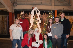 The Office for Alumni Relations staff at the Lights Before Christmas event